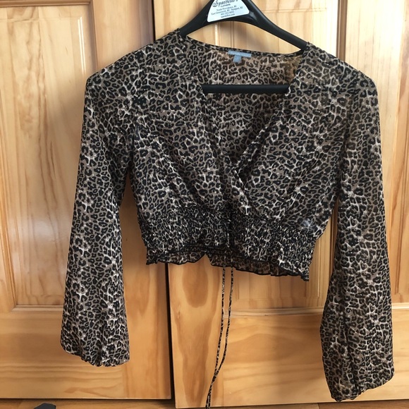 Charlotte Russe Tops - Cheetah print crop top